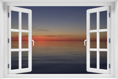 Fototapeta Naklejka Na Ścianę Okno 3D - Wschód słońca nad morzem