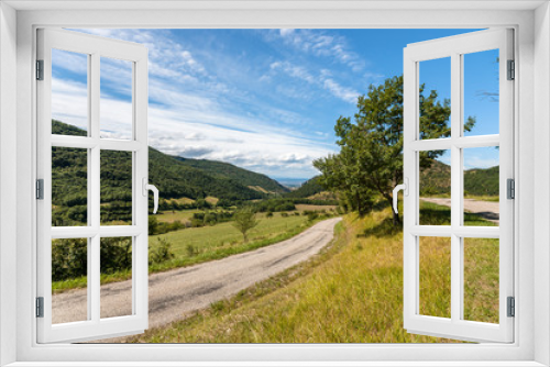 Fototapeta Naklejka Na Ścianę Okno 3D - Views over rolling hills and the distant plain of the Rhone valley in France