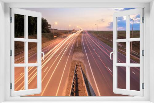 Fototapeta Naklejka Na Ścianę Okno 3D - Highway traffic in sunset 
