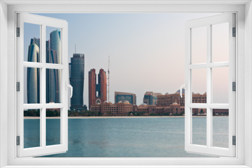 Fototapeta Naklejka Na Ścianę Okno 3D - Abu Dhabi buildings skyline from the sea
