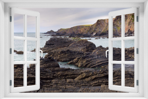Fototapeta Naklejka Na Ścianę Okno 3D - Rocky seashore in the county of Devon. Hartland Quay. UK