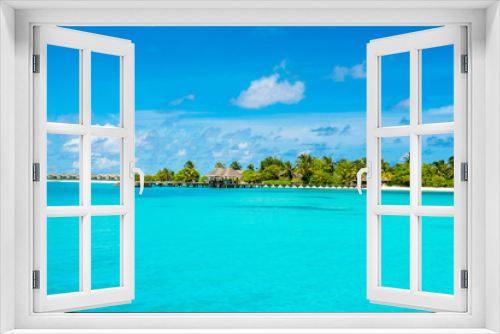 Fototapeta Naklejka Na Ścianę Okno 3D - Beautiful sandy beach with sunbeds and umbrellas in Indian ocean, Maldives island