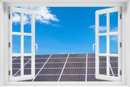 Fototapeta Naklejka Na Ścianę Okno 3D -  Solar  power panels for innovation green energy for life with mountains and blue sky background.