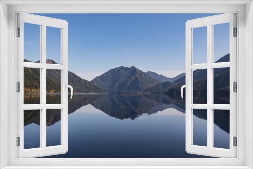 Fototapeta Naklejka Na Ścianę Okno 3D - Reflection on water Lake Crescent located 18 miles west of Port Angeles in the Olympic mountain foothills of Olympic National Park, Washington