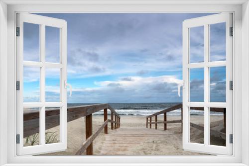 Fototapeta Naklejka Na Ścianę Okno 3D - Way to the beach. Marine landscape with wooden boardwalk leads to the atlantic ocean beach. Pawleys Island, Myrtle Beach area, South Carolina USA.