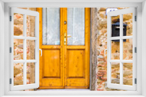 Fototapeta Naklejka Na Ścianę Okno 3D - wooden door in an italian village