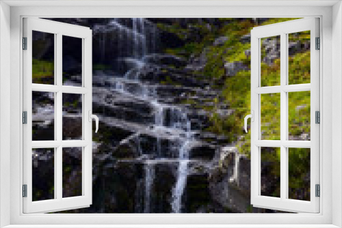 Fototapeta Naklejka Na Ścianę Okno 3D - Scenic wild waterfall in Fjordlande (Hjorundfjord), Norway