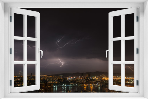 Fototapeta Naklejka Na Ścianę Okno 3D - Lightning storm over city.