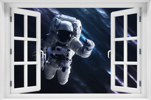 Fototapeta Naklejka Na Ścianę Okno 3D - Astronaut. Deep space image, science fiction fantasy in high resolution ideal for wallpaper and print. Elements of this image furnished by NASA