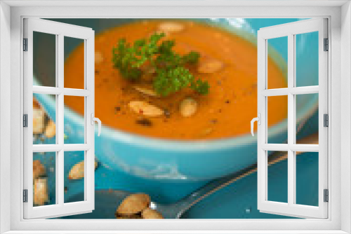 Fototapeta Naklejka Na Ścianę Okno 3D - Squash soup served with parsley and pumpkin seeds / Autumn concept