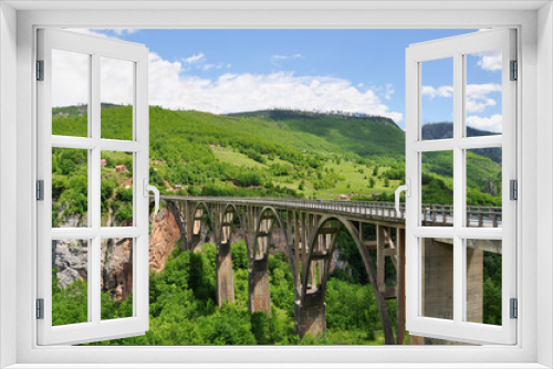Fototapeta Naklejka Na Ścianę Okno 3D - Djurdjevic's Bridge - a concrete arch bridge across the Tara River in Montenegro
