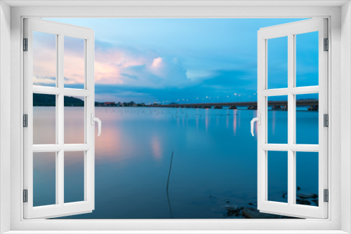 Fototapeta Naklejka Na Ścianę Okno 3D - Twilight sky during sunset over Ko Yo island, South Thailand with cloudy sky and long bridge.