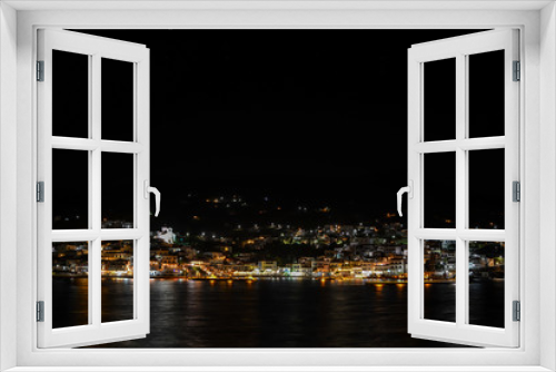 Fototapeta Naklejka Na Ścianę Okno 3D - Andros Batsi at night