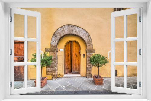 Fototapeta Naklejka Na Ścianę Okno 3D - Picturesque door in Tuscany