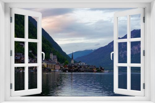 Fototapeta Naklejka Na Ścianę Okno 3D - Evening view of Lake Hallstatt and the village in the Alps, Austria.