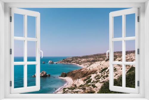 Fototapeta Naklejka Na Ścianę Okno 3D - Beautiful wild beach with clear turquoise water and rocks. Cyprus.