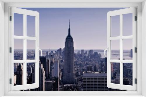 Fototapeta Naklejka Na Ścianę Okno 3D - Manhattan seen since the roof of one of the highest building of New York