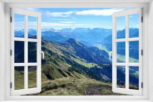 Fototapeta Naklejka Na Ścianę Okno 3D - Panoramic view of Brienz and the stunning view of mountain range in a beautiful day, Switzerland