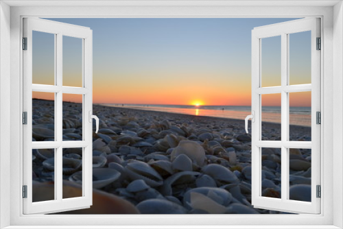 Fototapeta Naklejka Na Ścianę Okno 3D - Sonnenuntergang mit Muscheln