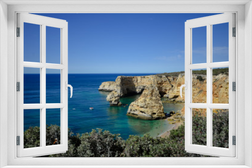 Fototapeta Naklejka Na Ścianę Okno 3D - Algarve coastline and beautiful sunny cliffs ocean natural outdoors background. Idyllic dream travel destination