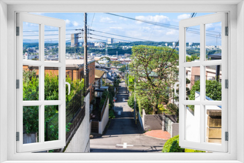 Fototapeta Naklejka Na Ścianę Okno 3D - 坂の上から眺める住宅街