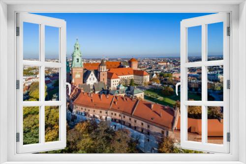 Fototapeta Naklejka Na Ścianę Okno 3D - Royal Wawel Gothic Cathedral in Cracow, Poland, part of Wawel Castle, yard, park and tourists. Aerial view at sunset in fall