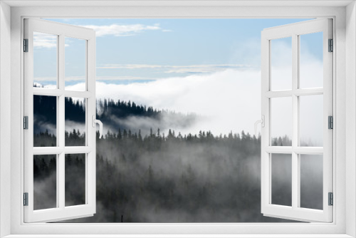 Fototapeta Naklejka Na Ścianę Okno 3D - panoramic view of of mountains in misty forest