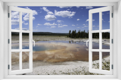Fototapeta Naklejka Na Ścianę Okno 3D - reflection of clouds in a sulphur pool at Yellowstone National Park
