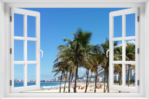 Fototapeta Naklejka Na Ścianę Okno 3D - View with coconut trees on copacabana beach Rio de Janeiro Brazil