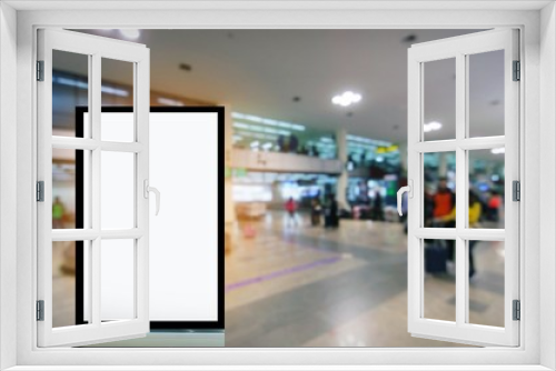 Fototapeta Naklejka Na Ścianę Okno 3D - mock up of blank showcase billboard or advertising light box for your text message or media and content with people at airport background, commercial, marketing and advertising concept