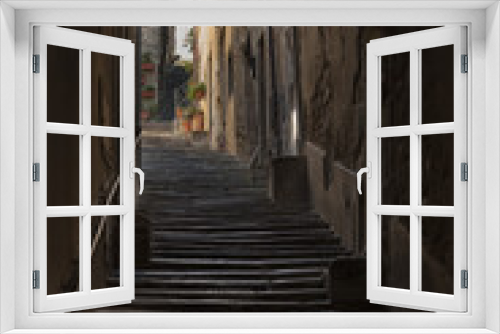 Fototapeta Naklejka Na Ścianę Okno 3D - Beautiful street of captivating medieval town of Cortona in Tuscany, Italy. It is an ancient Etruscan hill town, full of narrow steep streets, intimate piazzas, stunning artwork and historical museums