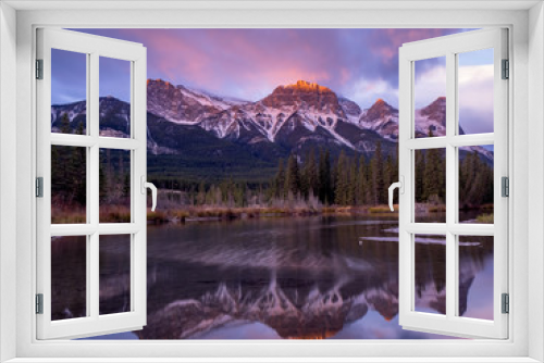 Fototapeta Naklejka Na Ścianę Okno 3D - Mount Lawrence Grassi outside Canmore in Alberta at sunrise.  