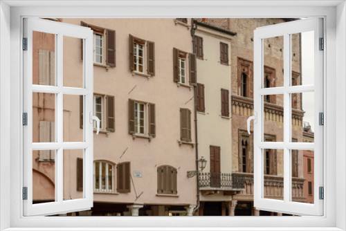 Fototapeta Naklejka Na Ścianę Okno 3D - facades of Renaissance buildings on Erbe square, Mantua, Italy