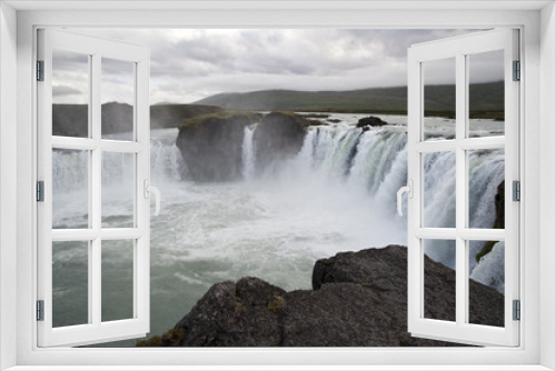 Fototapeta Naklejka Na Ścianę Okno 3D - Wonderful view of Gadafoss Falls in a typical Icelandic landscape, a wild nature of rocks and shrubs, rivers and lakes.