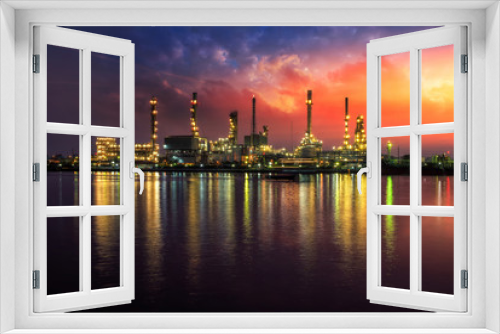 Fototapeta Naklejka Na Ścianę Okno 3D - Oil and gas industry - refinery at Sunrise - factory - petrochemical plant with reflection over the river