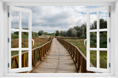 Fototapeta Naklejka Na Ścianę Okno 3D - Wooden walk bridge in nature park Kopacki rit