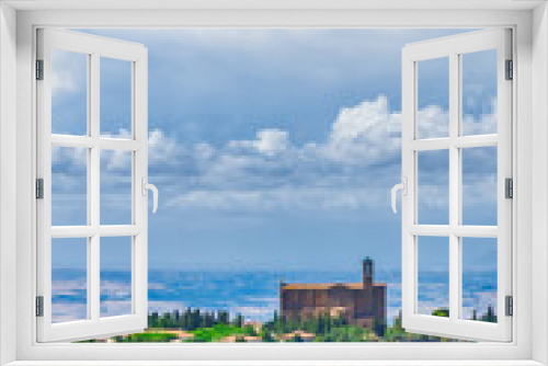 Fototapeta Naklejka Na Ścianę Okno 3D - The view from San Gimigiano on the church in Tuscany landscape
