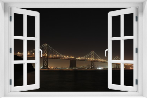 Fototapeta Naklejka Na Ścianę Okno 3D - トレジャー島から望むサンフランシスコ・オークランド・ベイブリッジ
