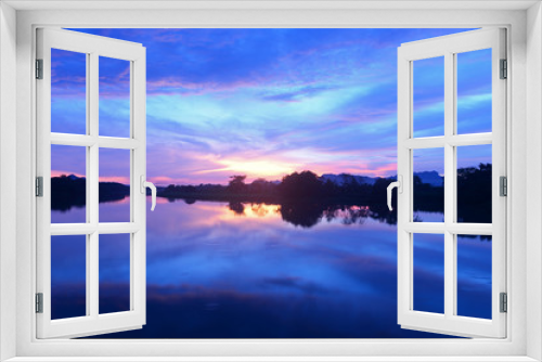 Fototapeta Naklejka Na Ścianę Okno 3D - Sunset beautiful sky reflection at lake and landscape view.