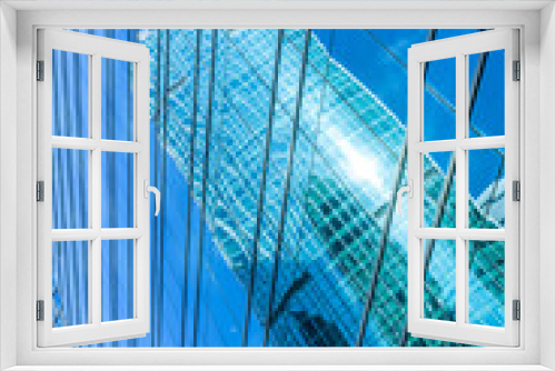 Fototapeta Naklejka Na Ścianę Okno 3D - Low angle view of skyscrapers architectural glass