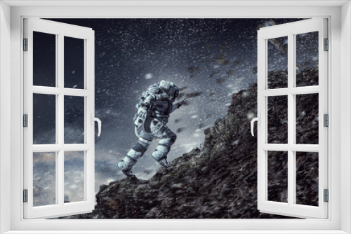 Fototapeta Naklejka Na Ścianę Okno 3D - Spaceman running fast. Mixed media