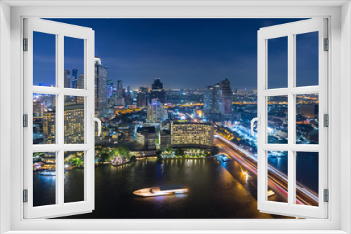 Fototapeta Naklejka Na Ścianę Okno 3D - Bangkok city skyline at night with Chao Phraya river view.