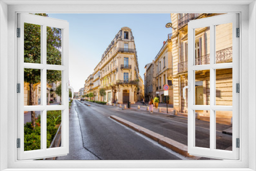 Fototapeta Naklejka Na Ścianę Okno 3D - Street view with beautiful old luxurois buildings on the Foch boulevard during the morning light in Montpellier city in Occitanie region of France
