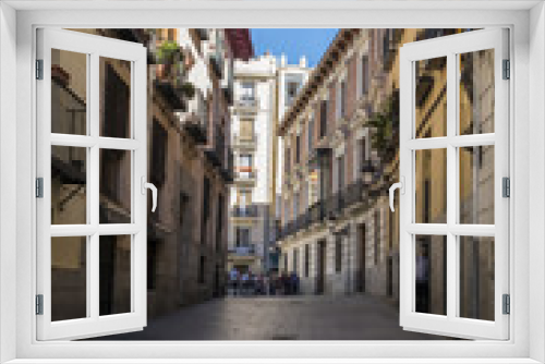 Fototapeta Naklejka Na Ścianę Okno 3D - A Typical Narrow Street in Madrid Spain