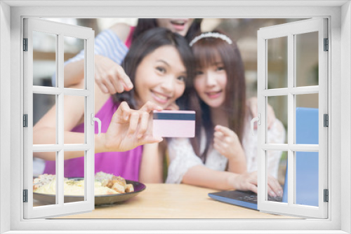 happy woman friends in restaurant