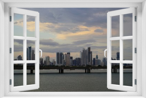 Fototapeta Naklejka Na Ścianę Okno 3D - A twilight view of Cinta Costera and modern Panama City skyline, Panama