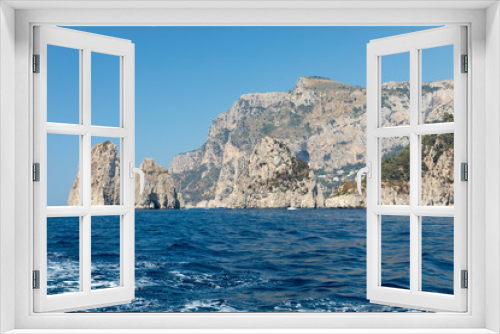 Fototapeta Naklejka Na Ścianę Okno 3D - View from the boat on the cliff coast of Capri Island, Italy