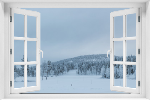 Fototapeta Naklejka Na Ścianę Okno 3D - Snowy mountains in lapland