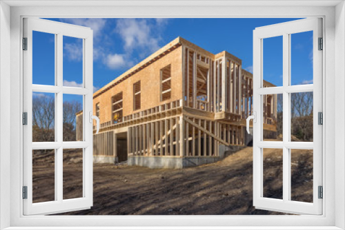 Fototapeta Naklejka Na Ścianę Okno 3D - New house construction framing