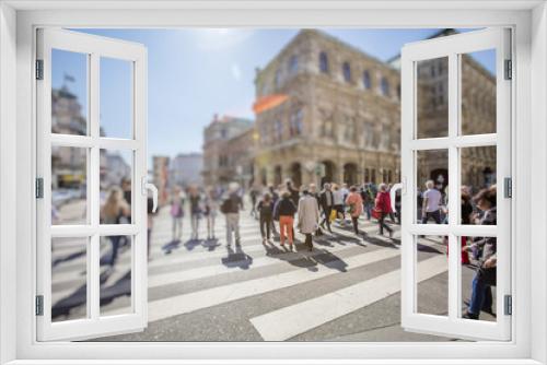 Fototapeta Naklejka Na Ścianę Okno 3D - Crowd of anonymous people walking on busy city street